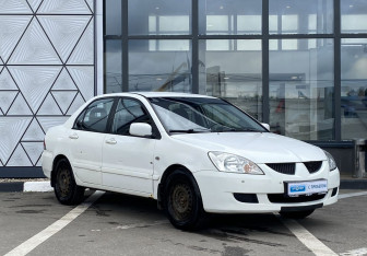 Подержанный автомобиль Mitsubishi Lancer Sedan 2009 года (3 фото)