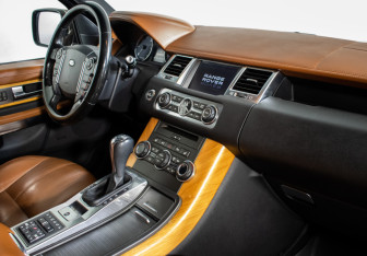 Подержанный автомобиль Land Rover Range Rover Sport 2012 года (11 фото)