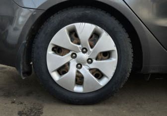 Подержанный автомобиль Kia Rio Sedan 2014 года (13 фото)