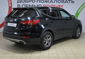 Подержанный автомобиль Hyundai Santa Fe 2014 года (4 фото)