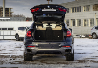 Подержанный автомобиль BMW X6 2015 года (25 фото)