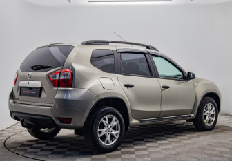 Подержанный автомобиль Nissan Terrano 2014 года (5 фото)