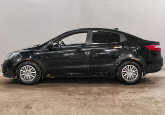 Подержанный автомобиль Kia Rio Sedan 2012 года (8 фото)