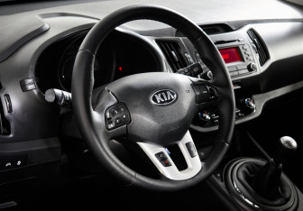Подержанный автомобиль Kia Sportage 2013 года (11 фото)