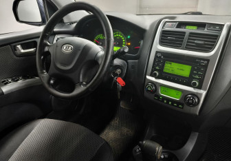 Подержанный автомобиль Kia Sportage 2009 года (9 фото)