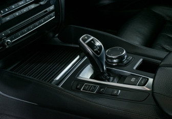 Подержанный автомобиль BMW X6 2015 года (18 фото)