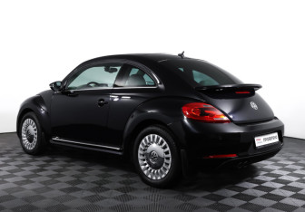 Подержанный автомобиль Volkswagen Beetle Hatchback 2014 года (7 фото)