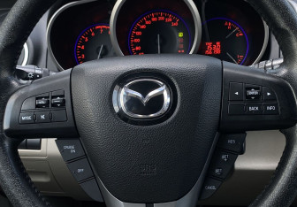Подержанный автомобиль Mazda CX-7 2010 года (14 фото)