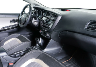 Подержанный автомобиль Kia Ceed Wagon 2013 года (9 фото)