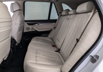 Подержанный автомобиль BMW X5 2014 года (18 фото)