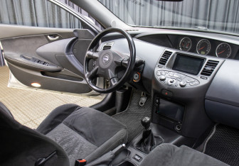 Подержанный автомобиль Nissan Primera Sedan 2003 года (11 фото)