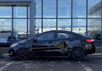 Подержанный автомобиль Kia Rio Sedan 2013 года (8 фото)