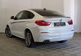 Подержанный автомобиль BMW X4 2015 года (7 фото)
