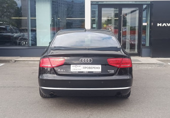 Подержанный автомобиль Audi A8 2014 года (6 фото)