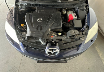 Подержанный автомобиль Mazda CX-7 2011 года (9 фото)