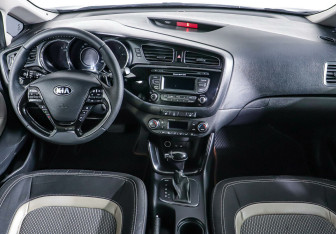 Подержанный автомобиль Kia Ceed Wagon 2013 года (10 фото)