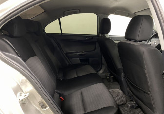 Подержанный автомобиль Mitsubishi Lancer Sedan 2012 года (20 фото)