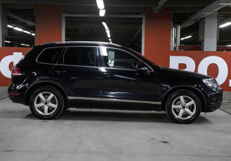 Подержанный автомобиль Volkswagen Touareg 2014 года (4 фото)
