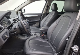 Подержанный автомобиль BMW X1 2015 года (10 фото)