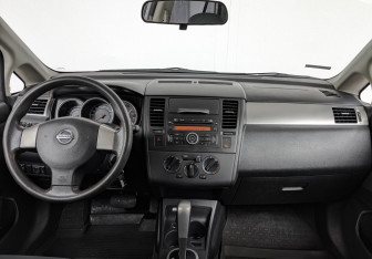 Подержанный автомобиль Nissan Tiida Sedan 2012 года (14 фото)