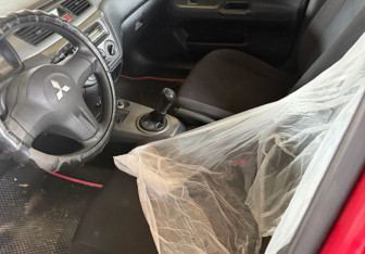 Подержанный автомобиль Mitsubishi Lancer Sedan 2007 года (18 фото)