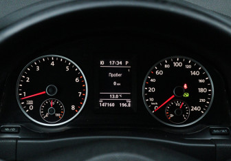 Подержанный автомобиль Volkswagen Tiguan 2013 года (14 фото)