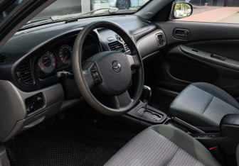 Подержанный автомобиль Nissan Almera Classic 2011 года (12 фото)