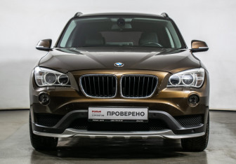 Подержанный автомобиль BMW X1 2014 года (2 фото)