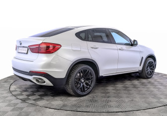 Подержанный автомобиль BMW X6 2016 года (5 фото)