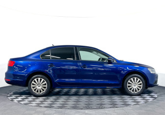 Подержанный автомобиль Volkswagen Jetta Sedan 2014 года (4 фото)