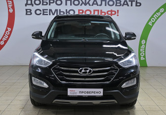 Подержанный автомобиль Hyundai Santa Fe 2014 года (2 фото)