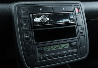 Подержанный автомобиль Volkswagen Sharan 2005 года (14 фото)