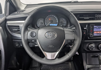 Подержанный автомобиль Toyota Corolla Sedan 2014 года (22 фото)