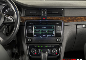 Подержанный автомобиль Skoda Superb Liftback 2014 года (14 фото)