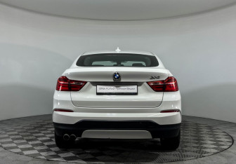 Подержанный автомобиль BMW X4 2015 года (4 фото)