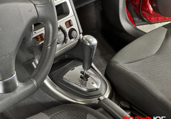 Подержанный автомобиль Peugeot 308 Hatchback 2010 года (15 фото)