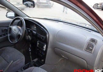 Подержанный автомобиль Kia Spectra Sedan 2006 года (7 фото)