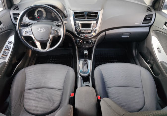 Подержанный автомобиль Hyundai Solaris Hatchback 2015 года (10 фото)