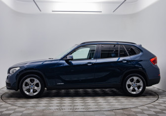 Подержанный автомобиль BMW X1 2014 года (8 фото)