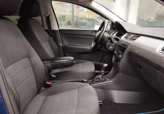 Подержанный автомобиль Skoda Rapid Liftback 2014 года (10 фото)