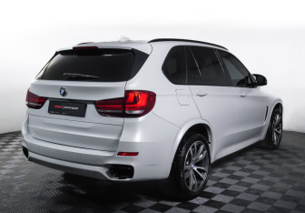 Подержанный автомобиль BMW X5 2015 года (5 фото)