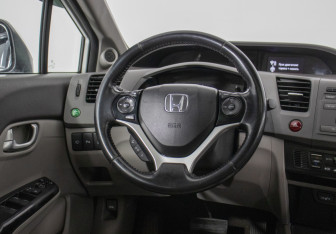 Подержанный автомобиль Honda Civic Sedan 2012 года (14 фото)