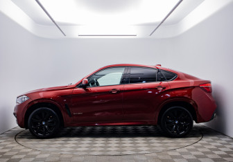 Подержанный автомобиль BMW X6 2015 года (2 фото)