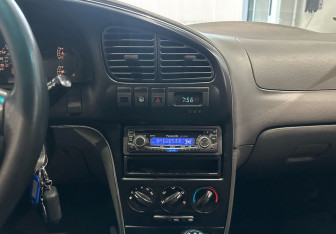 Подержанный автомобиль Kia Spectra Sedan 2008 года (16 фото)