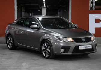 Подержанный автомобиль Kia Cerato Coupe 2012 года (3 фото)