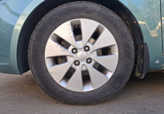 Подержанный автомобиль Kia Rio Sedan 2012 года (9 фото)