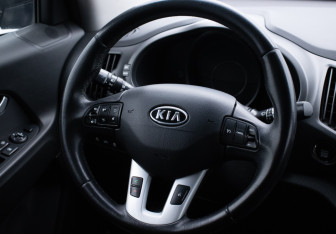 Подержанный автомобиль Kia Sportage 2011 года (15 фото)