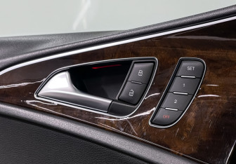 Подержанный автомобиль Audi A6 allroad 2014 года (15 фото)