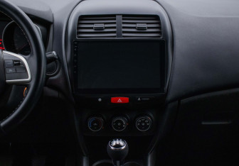 Подержанный автомобиль Mitsubishi ASX 2013 года (14 фото)