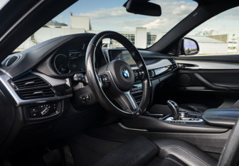 Подержанный автомобиль BMW X6 2018 года (9 фото)